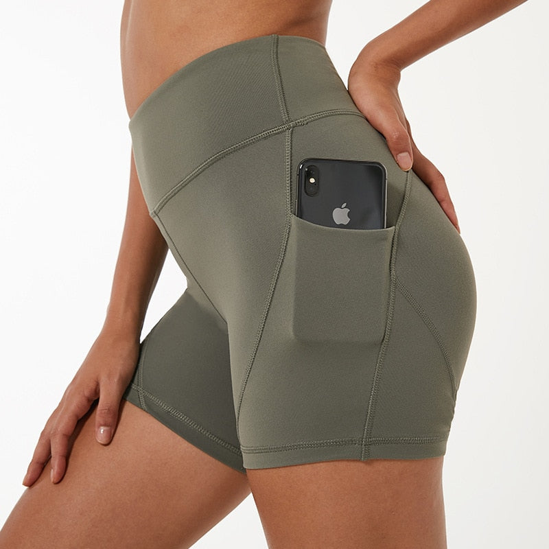 Shorts avec poches de téléphone solide pour femmes.Short de course.